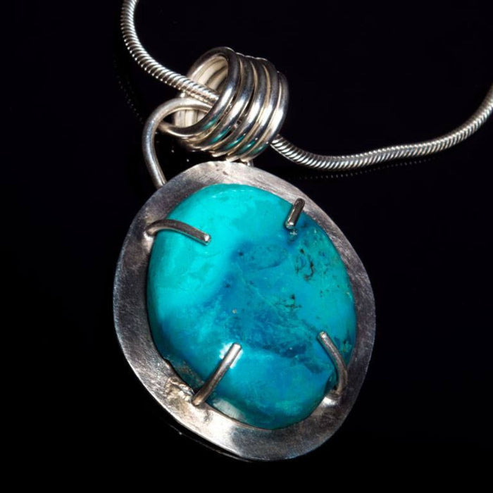 Chrysocolla cabochon prong set pendant