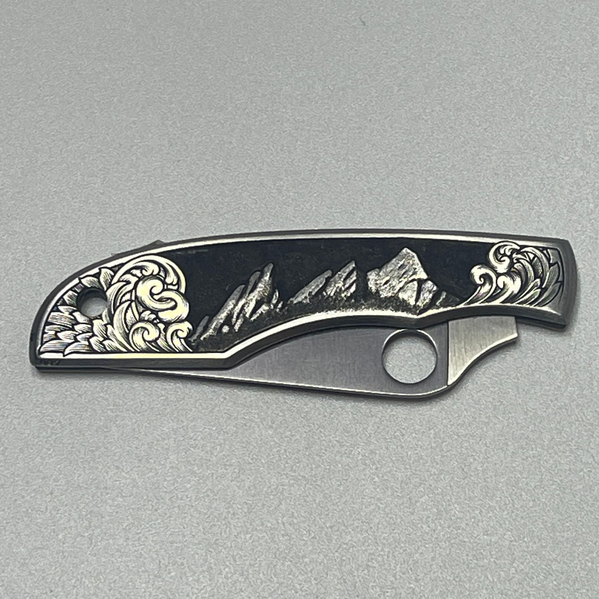 Hand-engraved Boulder Flatirons Spyderco Knife