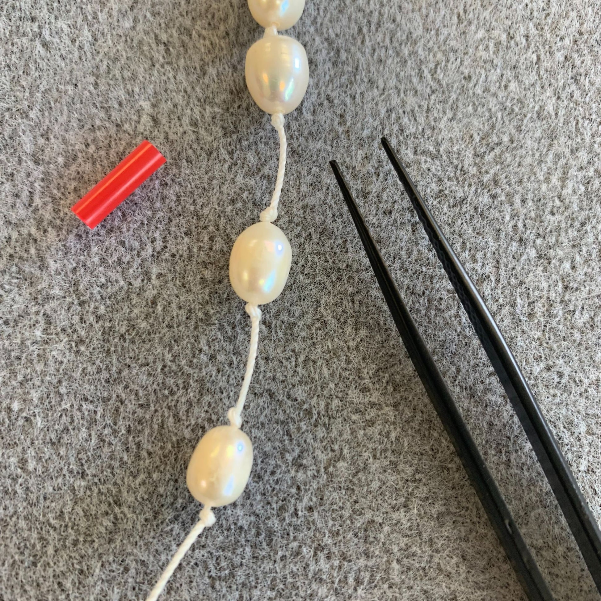 pearls knotting and tweezers