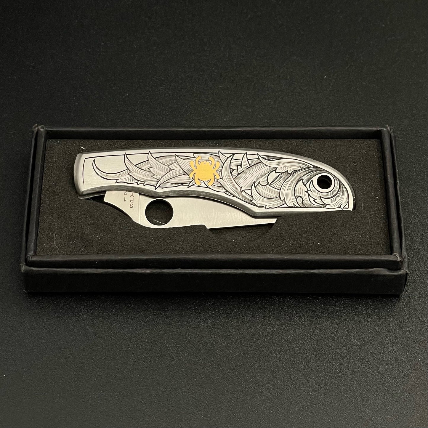 Elaborate hand-engraved Spyderco Pocket Knife - Grasshopper size