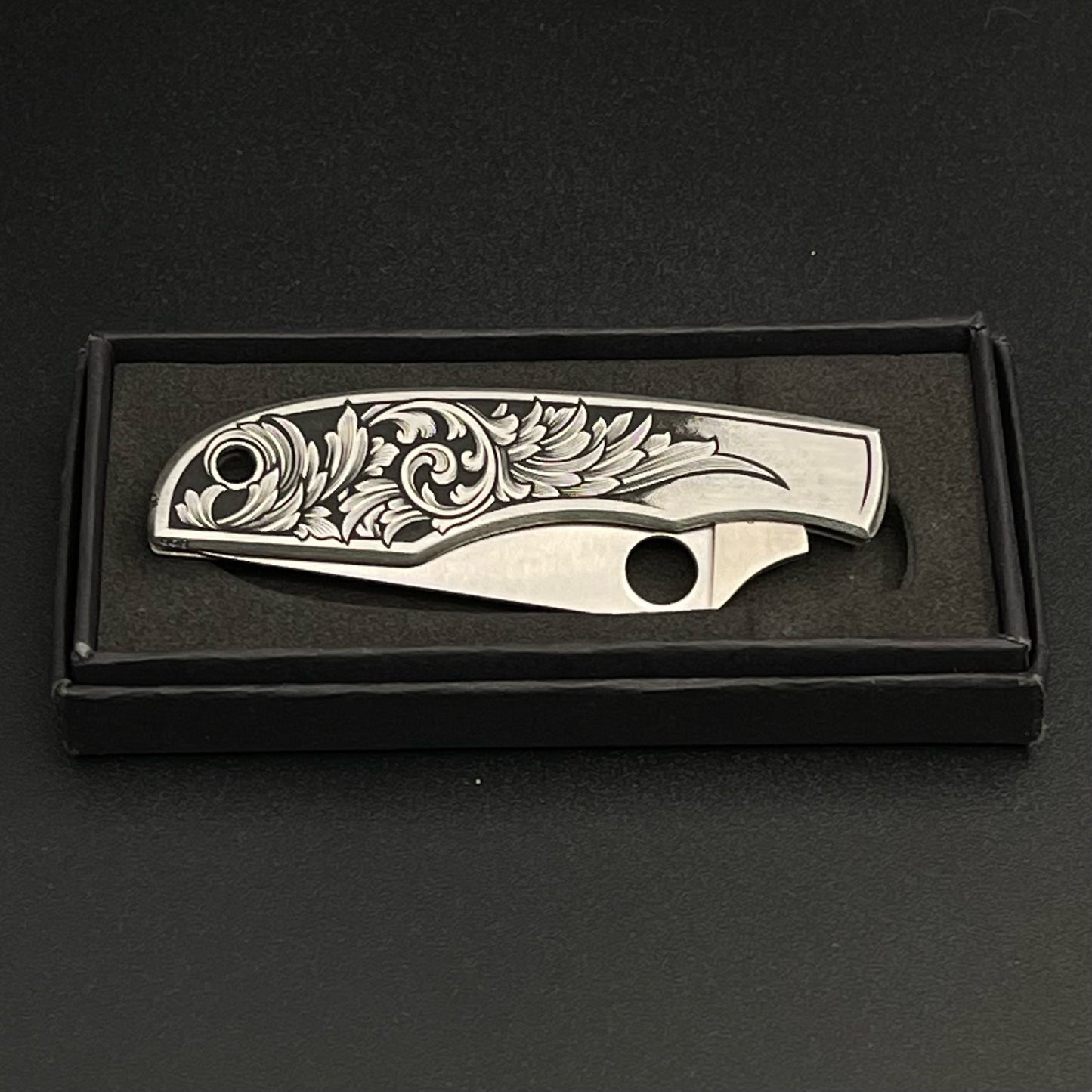 Elaborate hand-engraved Spyderco Pocket Knife - Grasshopper size